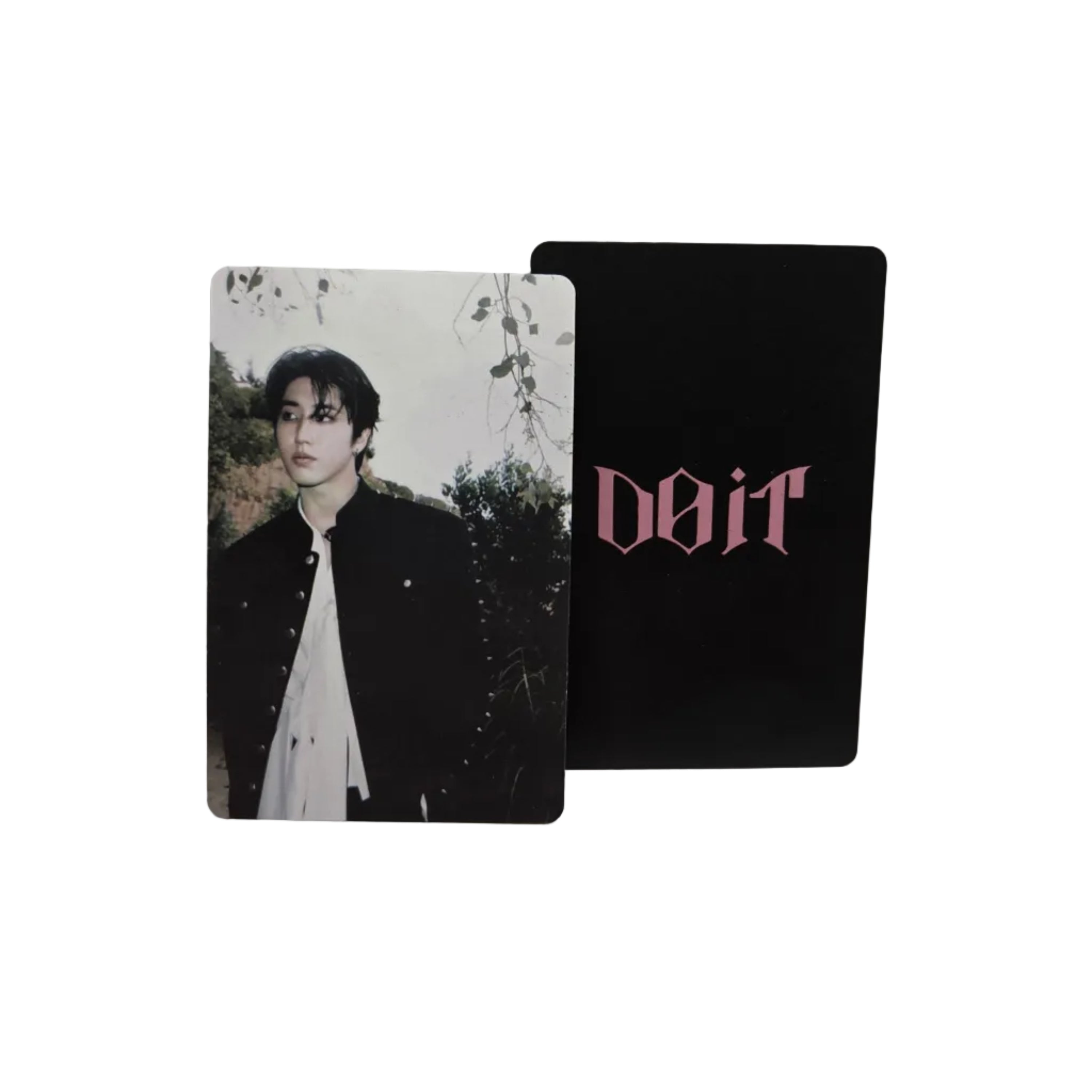 Two cards, one with a black background and text, the other with a photo of a person outdoors, on a light gray surface.