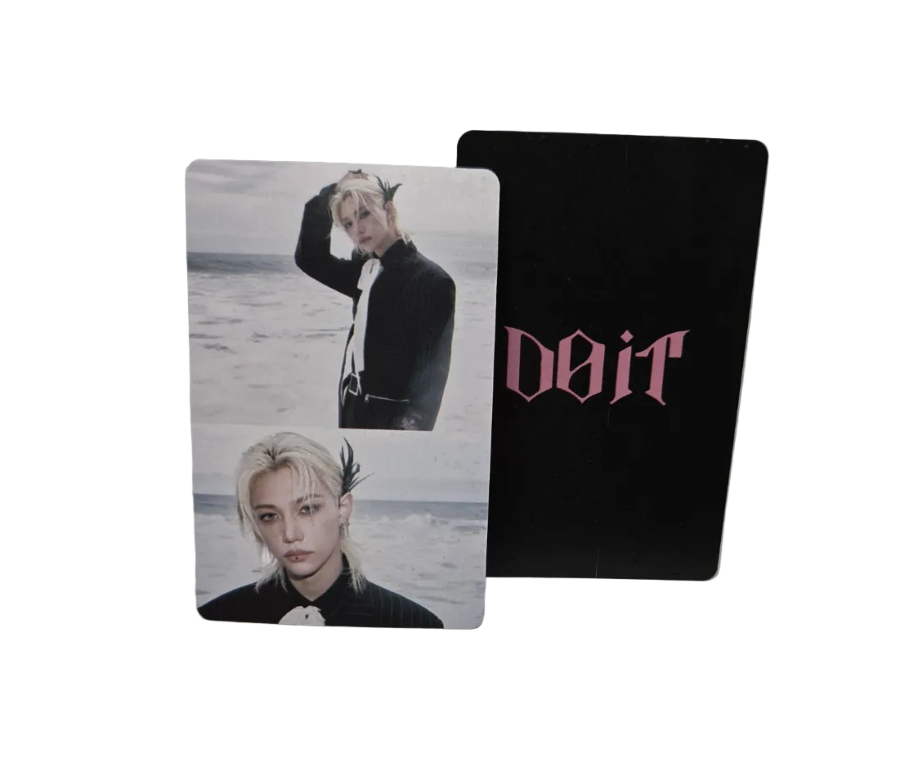 Two cards with images of a person on a white surface