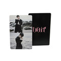 Two cards with a black card featuring pink text and a photo card with two people on a beach.