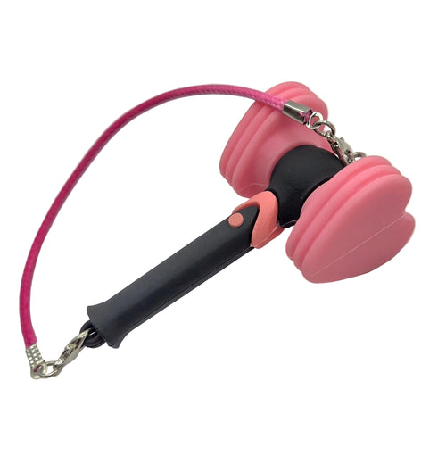 Pink and black handle with a pink rope on a white background