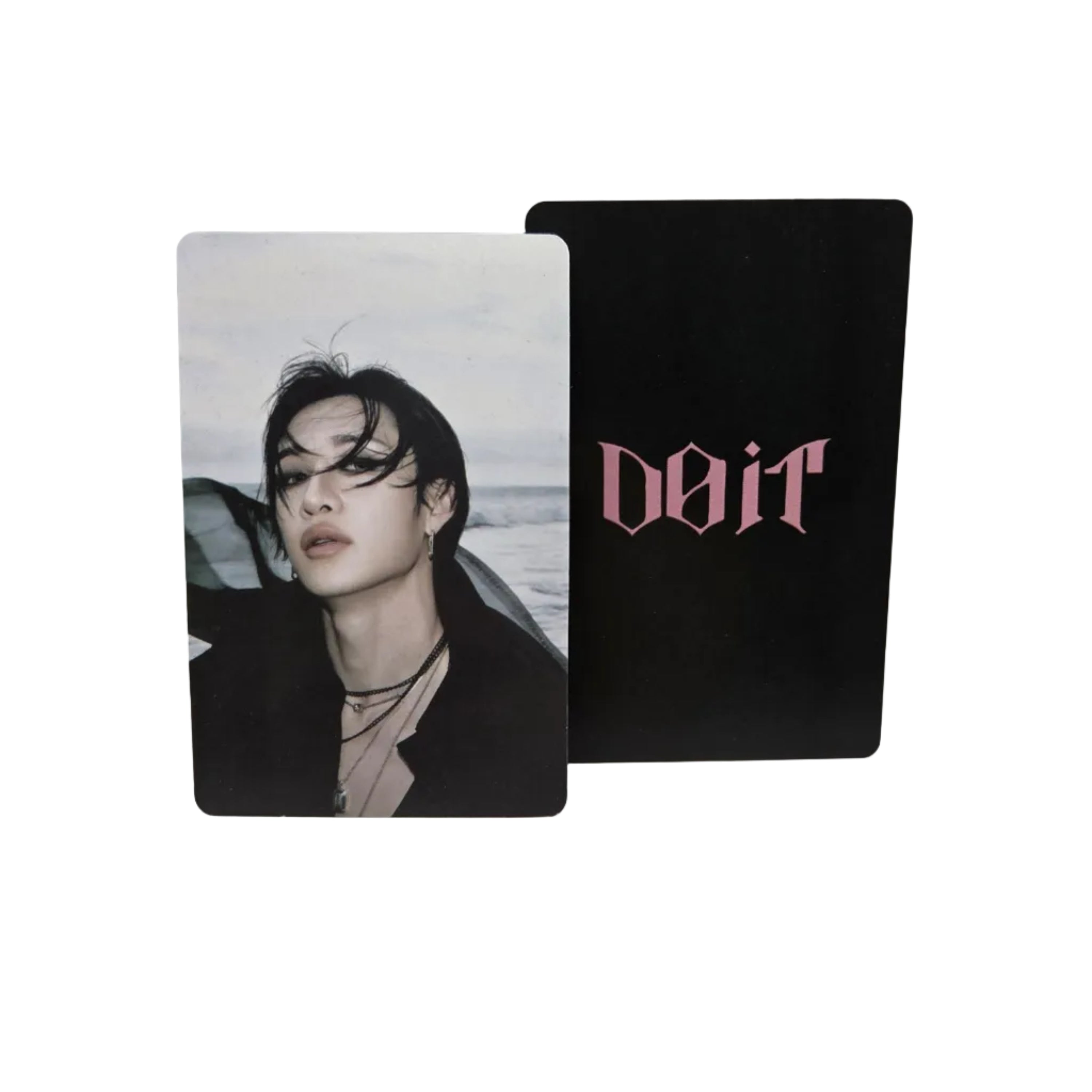 Two cards with a black card featuring a pink logo and a white card with a person's portrait on a light gray background.